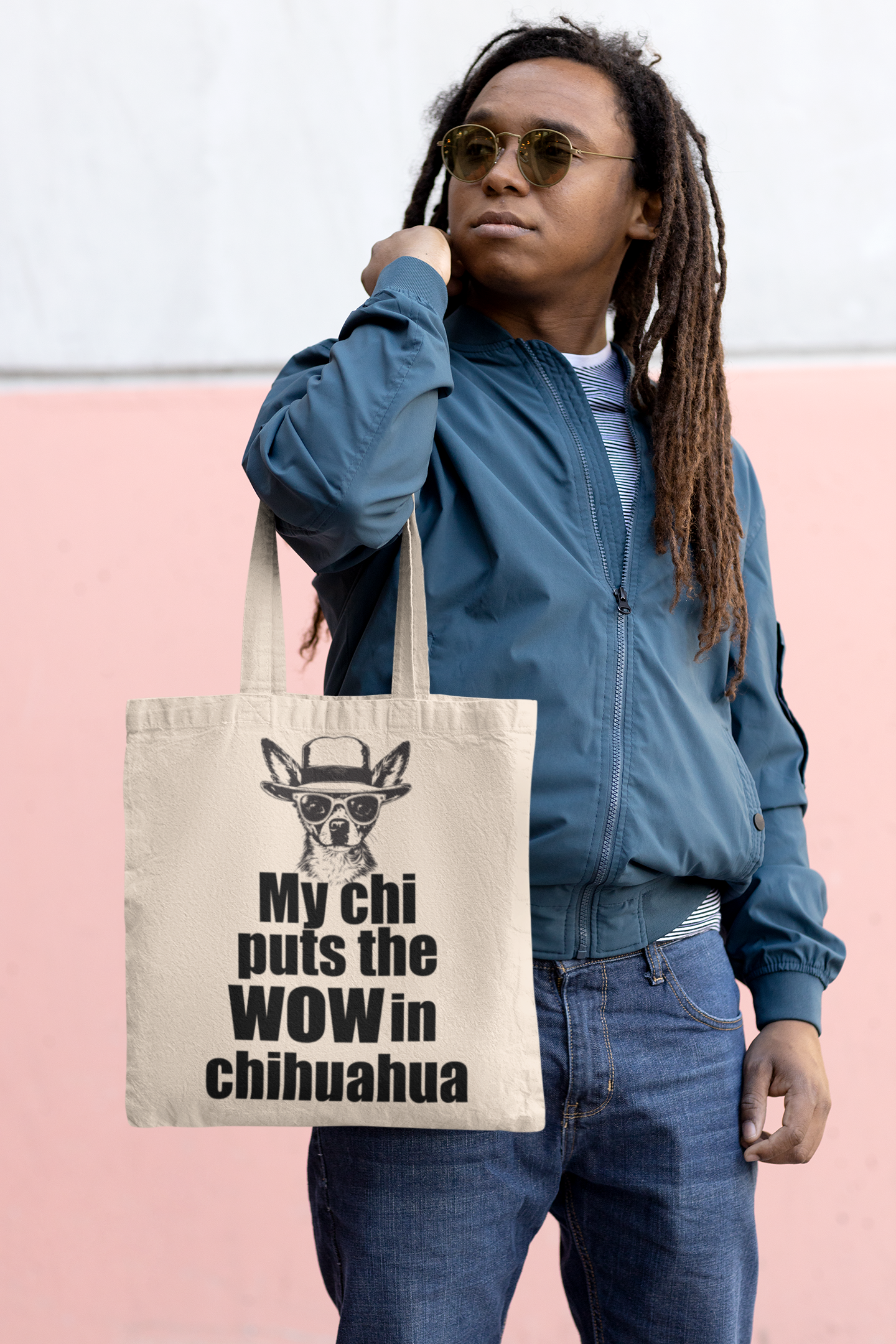 Man carrying chihuahua bag